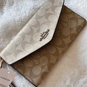 Coach Two-Tone Signature Envelope Clutch in Cream and Tan